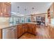 Open kitchen design with granite countertops and stainless steel appliances at 255 Sageglen Rd, Lawrenceville, GA 30044