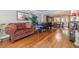 A living room features hardwood floors and a view into the dining room at 255 Sageglen Rd, Lawrenceville, GA 30044