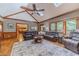 Open concept living room with hardwood floors, large windows, and vaulted ceilings at 255 Sageglen Rd, Lawrenceville, GA 30044