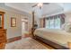 Bright main bedroom with trey ceilings, light walls, and hardwood floors at 255 Sageglen Rd, Lawrenceville, GA 30044