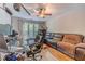 Cozy office features an entertainment area and large picture window at 255 Sageglen Rd, Lawrenceville, GA 30044