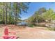 Serene pond view featuring a sitting area to enjoy the scenic landscape at 255 Sageglen Rd, Lawrenceville, GA 30044
