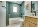 Stylish bathroom features modern fixtures, herringbone tile, and shower over tub at 3244 Mount Olive Rd, Atlanta, GA 30344