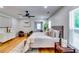 Bright bedroom with hardwood flooring and neutral walls at 3244 Mount Olive Rd, Atlanta, GA 30344