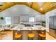 Bright kitchen features a large island with seating and stainless steel appliances at 3244 Mount Olive Rd, Atlanta, GA 30344