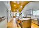 Open floor plan featuring the kitchen, dining and living areas with ample light and modern finishes at 3244 Mount Olive Rd, Atlanta, GA 30344