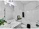 Bathroom featuring a shower and bath combination and a large vanity at 4414 Aldenham Way, Suwanee, GA 30024