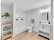Modern bathroom featuring a shower-tub combo, a white vanity, and stylish decor at 4414 Aldenham Way, Suwanee, GA 30024
