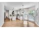 Beautiful eat-in kitchen with an island, stainless appliances, and doors to the backyard at 4414 Aldenham Way, Suwanee, GA 30024