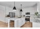 Modern kitchen with stainless steel appliances, granite countertops, and a center island at 4414 Aldenham Way, Suwanee, GA 30024