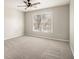 Bright bedroom with large window offering ample natural light and neutral decor at 5222 Camden Lake Nw Pkwy, Acworth, GA 30101