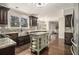 Charming kitchen featuring a farmhouse sink, kitchen island, and stainless steel appliances at 5222 Camden Lake Nw Pkwy, Acworth, GA 30101