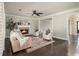 Comfortable living room with hardwood floors, fireplace, and neutral color palette at 5222 Camden Lake Nw Pkwy, Acworth, GA 30101