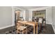 Cozy home office featuring neutral walls, hardwood floors and a small desk with chairs at 5222 Camden Lake Nw Pkwy, Acworth, GA 30101