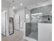 A modern bathroom with a glass-enclosed shower, designer tile and sleek fixtures at 917 Derrydown Way, Decatur, GA 30030