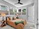 Cozy bedroom with carpet, large windows, and neutral tones creating a peaceful retreat at 917 Derrydown Way, Decatur, GA 30030