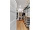 Walk-in closet with generous shelving, hanging space, and natural wood accents at 917 Derrydown Way, Decatur, GA 30030