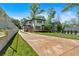 Backyard view of house, lawn, and extra parking space at 917 Derrydown Way, Decatur, GA 30030