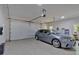 Spacious garage with epoxy flooring and car charging station at 917 Derrydown Way, Decatur, GA 30030