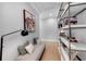 Cozy hallway featuring a comfortable bench and stylish shelving unit at 917 Derrydown Way, Decatur, GA 30030