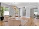 Bright living room with hardwood floors, contemporary furnishings, and a view to the staircase at 917 Derrydown Way, Decatur, GA 30030