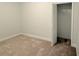 A bedroom with neutral colors and an open closet at 2575 Rosehill Circle, Lithia Springs, GA 30122
