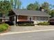 Cozy community center with a handicap parking space and well-maintained landscaping at 2575 Rosehill Circle, Lithia Springs, GA 30122