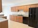 Well-lit kitchen featuring ample wood cabinetry, stainless steel appliances, and light countertops at 2575 Rosehill Circle, Lithia Springs, GA 30122