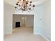 Living room with fireplace and chandelier at 2575 Rosehill Circle, Lithia Springs, GA 30122