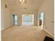 Open concept living room leading to the dining room and kitchen at 2575 Rosehill Circle, Lithia Springs, GA 30122