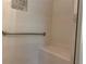 This tile shower features a seat, handrail and niche at 2575 Rosehill Circle, Lithia Springs, GA 30122