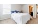 Neutral bedroom featuring a large window, carpet and neutral colors at 8045 Hillside Climb Way, Snellville, GA 30039