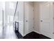 Inviting foyer boasting hardwood floors, a staircase, and white-painted doors at 8045 Hillside Climb Way, Snellville, GA 30039