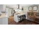 Modern kitchen featuring stainless steel appliances, bar seating, and white cabinetry at 1384 Windburn Dr, Marietta, GA 30066