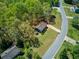 High angle view of home and backyard showing the home's setting within the neighborhood at 166 Rustin Dr, Dallas, GA 30157