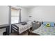 Shared bedroom featuring twin beds, wood floors, and ample space for relaxation at 166 Rustin Dr, Dallas, GA 30157