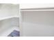 Spacious walk-in closet featuring rod and shelving space at 166 Rustin Dr, Dallas, GA 30157