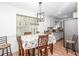Cozy dining area featuring natural light from a nearby window and comfortable seating for Gathering meals and gatherings at 166 Rustin Dr, Dallas, GA 30157