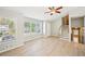 Open living room with natural light, new flooring, and staircase access at 1900 Foster Trace Ct, Lawrenceville, GA 30043