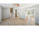 Open concept living area with stairs and access to the kitchen at 1900 Foster Trace Ct, Lawrenceville, GA 30043