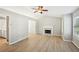 Bright living room features a fireplace and an open floorplan at 1900 Foster Trace Ct, Lawrenceville, GA 30043