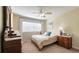 Neutral bedroom with a ceiling fan, carpet flooring and natural light from the window at 311 Peachtree Hills Ne Ave # 17C, Atlanta, GA 30305