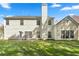 Backyard featuring a well-maintained lawn and a patio area, perfect for outdoor enjoyment at 3889 Elm Trace Dr, Loganville, GA 30052