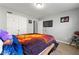 Inviting bedroom with closet, TV, and stylish decor at 3889 Elm Trace Dr, Loganville, GA 30052
