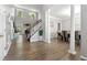Spacious entrance foyer featuring high ceilings with an open view of the dining room at 3889 Elm Trace Dr, Loganville, GA 30052