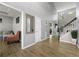 Inviting foyer featuring wood floors and staircase with plenty of natural light at 3889 Elm Trace Dr, Loganville, GA 30052