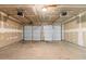 Spacious garage with two automatic garage doors and plenty of room for parking and storage at 9347 Haley Ct, Jonesboro, GA 30238