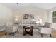 Inviting living room with vaulted ceilings, modern furnishings, and natural light at 9347 Haley Ct, Jonesboro, GA 30238