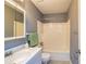 Bathroom featuring tub-shower combo, vanity with sink and mirror at 108 Dove, Peachtree City, GA 30269