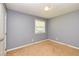 Bedroom featuring neutral walls, carpet and a window offering natural light at 108 Dove, Peachtree City, GA 30269